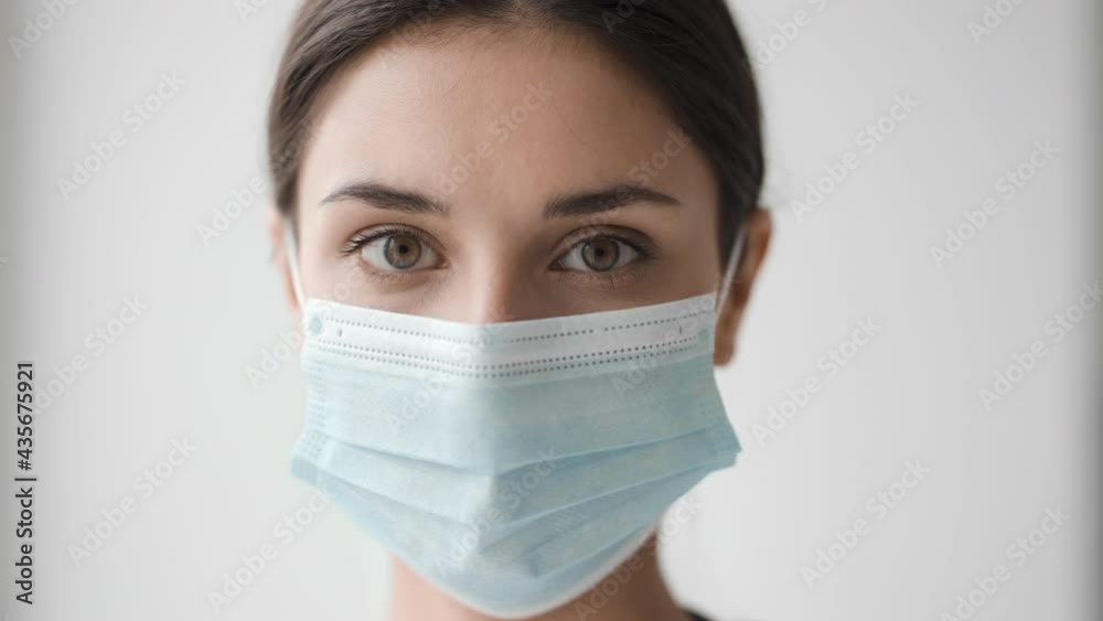 Doctor woman medical mask female face close up clinic office consultation 