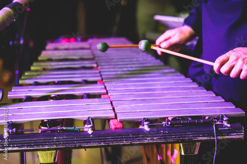 Fotografie Xylophone concert view of vibraphone marimba player, mallets drum sticks, with a