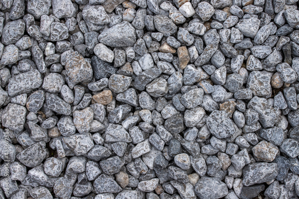 texture of gravel stones on ground background texture of gravel stones on ground background