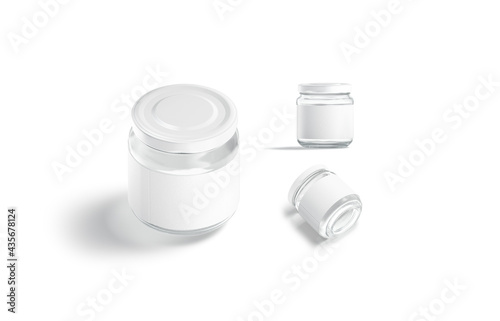 Blank small glass jar with white label mockup, different views photo