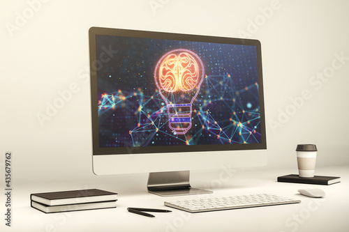 Modern computer monitor with creative light bulb hologram with human brain, idea and brainstorming concept. 3D Rendering