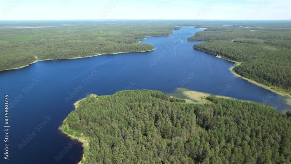 Flight over the taiga forest lake Flight over the taiga forest lake