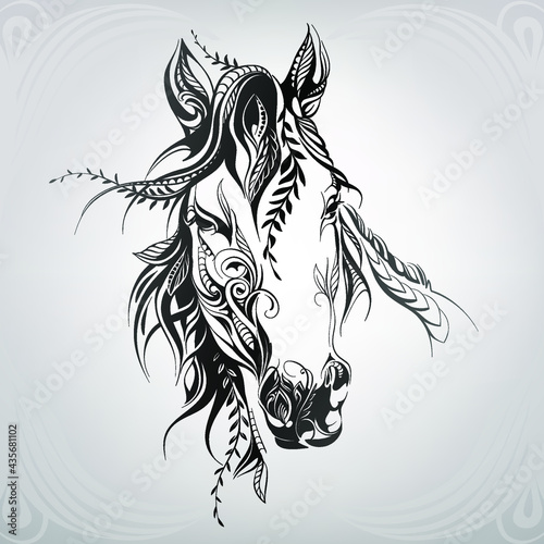 Horse head in floral ornament