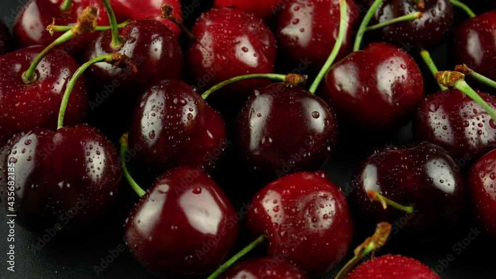 Wet cherry fruit with drops. Hand takes a cherry from the heap of cherries. Firs person view, choose fruit to eat. 4k video. Wet cherry fruit with drops. Hand takes a cherry from the heap of cherries. Firs person view, choose fruit to eat. 4k video.