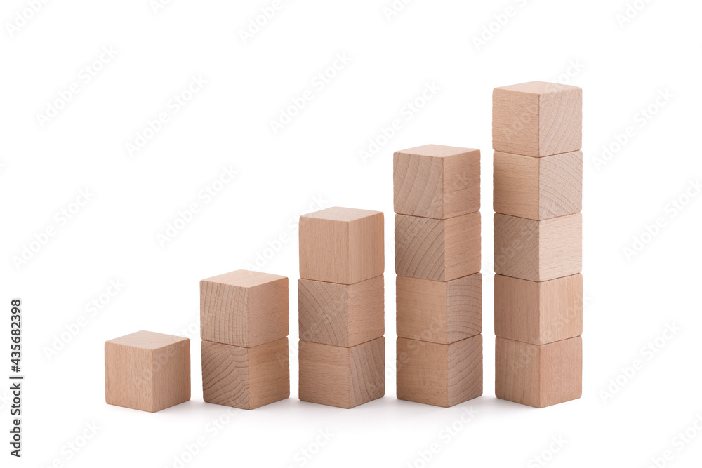 Rising wooden square blocks on white background with clipping path Rising wooden square blocks on white background with clipping path