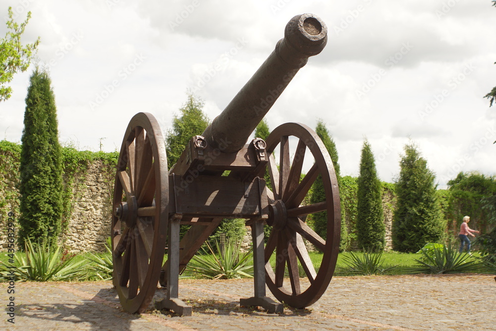 Old cannon on the pavement 