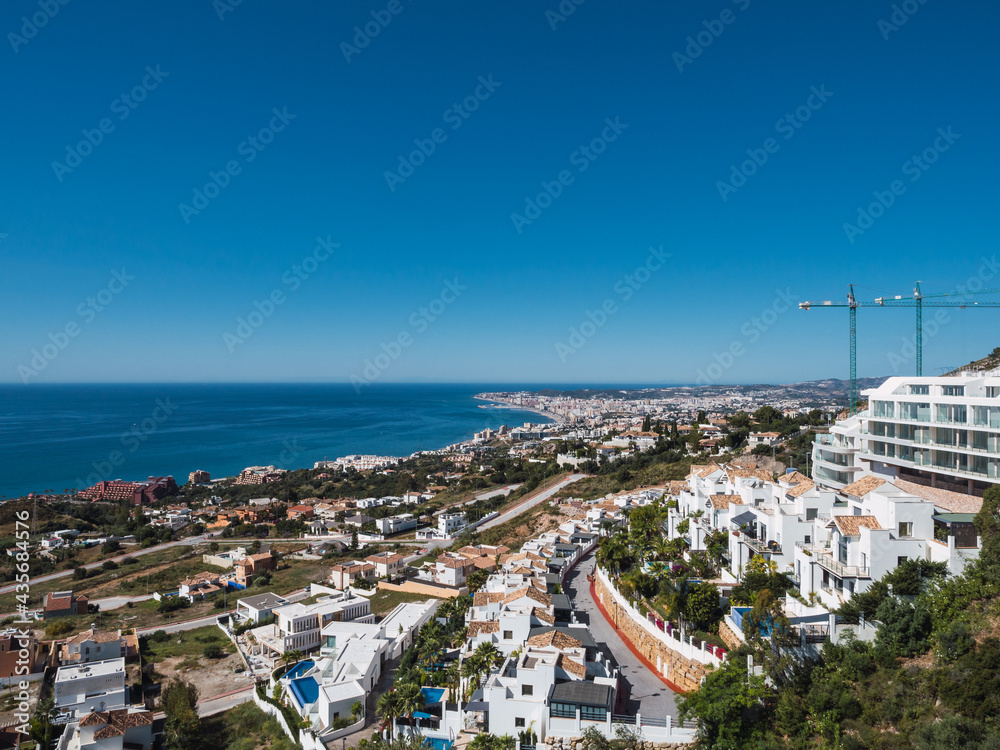View of Fuengirola , Costa del Sol, Malaga province, Spain.  Typical white urbanizations on the Costa del Sol with blue sky.