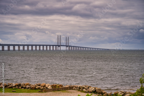 The Bridge over the Sound between Copenhagen and Malmo with a beautiful, dramatic sky in the background. Picture from Malmo, Sweden photo