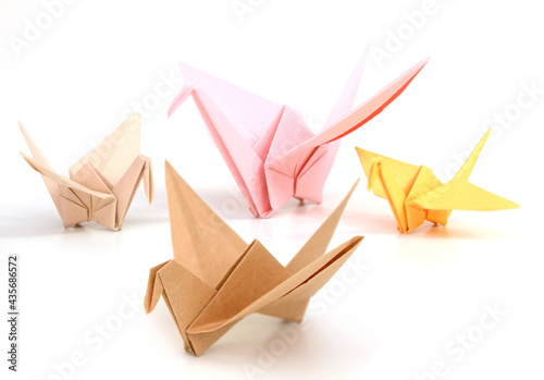 Origami cranes on white