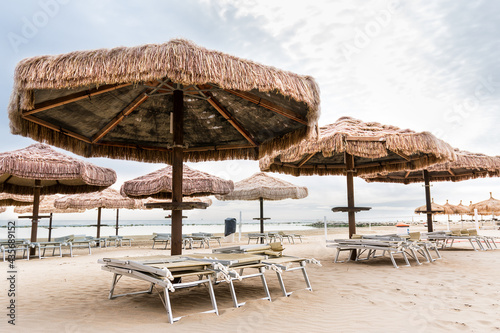 Palm umbrellas on the beach in Pescara  Abruzzo 