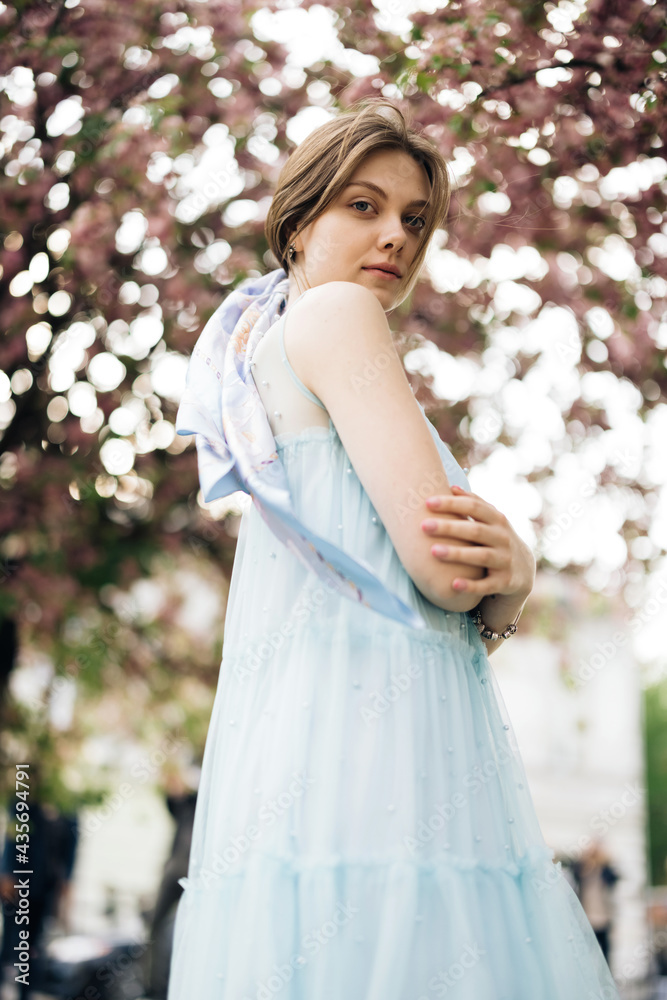 Portrait young woman at sunlight with long hair look at camera smiling. Fashion model female girl cosmetic beauty confident happy cheerful. Portrait young woman at sunlight with long hair look at camera smiling. Fashion model female girl cosmetic beauty confident happy cheerful.