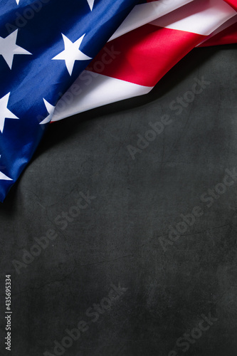 American flag on dark concrete background. USA national holidays concept. Independence Day, Memorial Day, Labor Day.