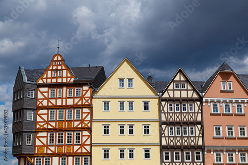 Beautiful colored half-timbered houses close-up in Hessenpark, Germany.