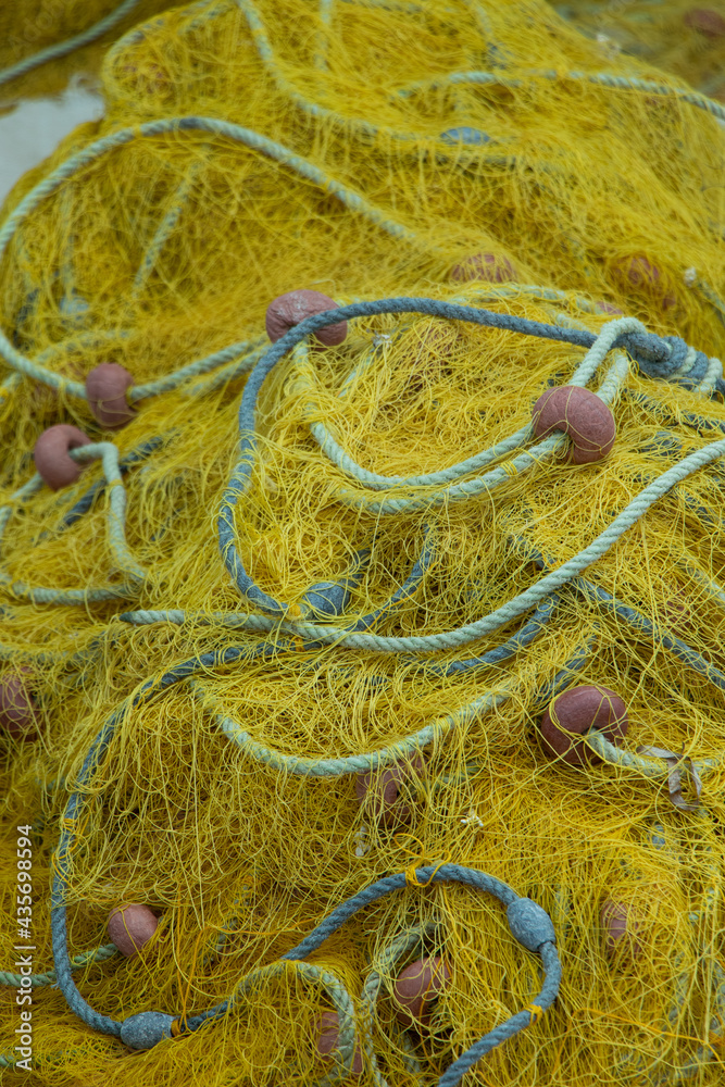 Fishing net on a wooden boat Fishing net on a wooden boat