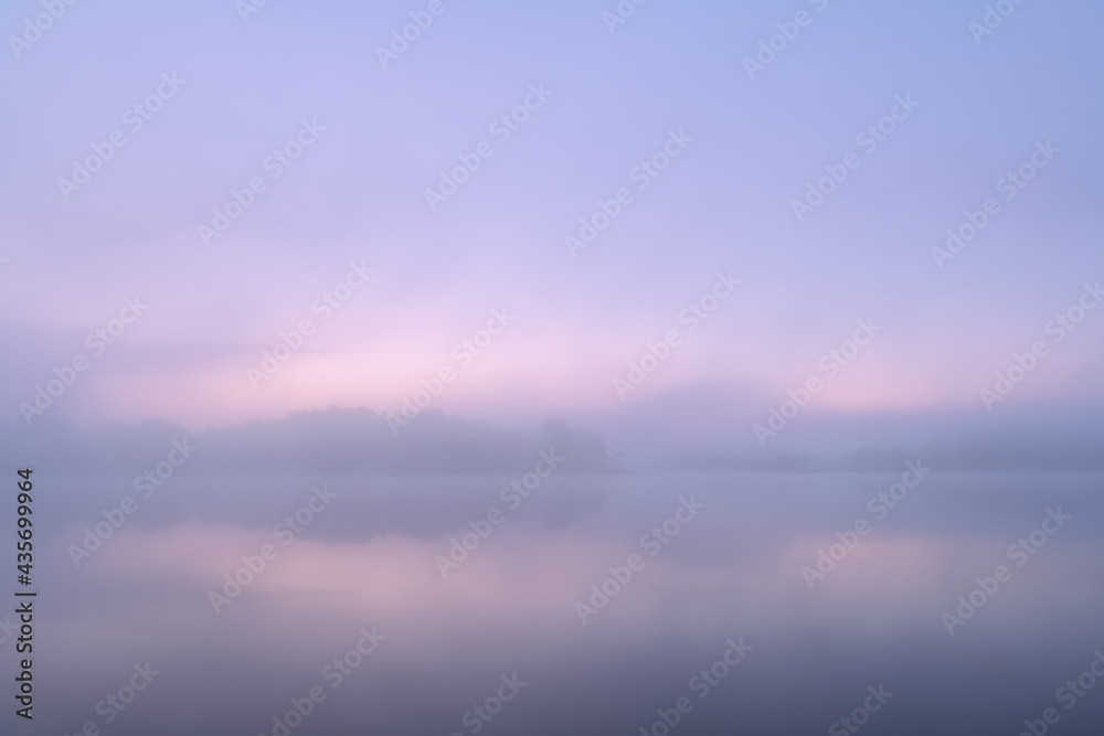Landscape of the foggy, summer shoreline of Whitford Lake at dawn, Fort Custer State Park, Michigan, USA Landscape of the foggy, summer shoreline of Whitford Lake at dawn, Fort Custer State Park, Michigan, USA