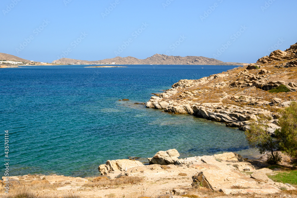Beautiful bay with blue crystal waters in Naoussa village. Paros island, Greece