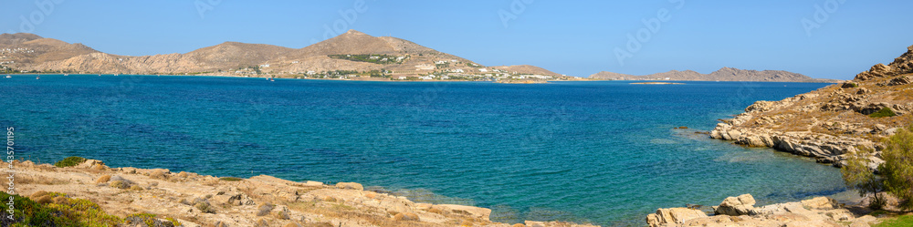 Beautiful bay with blue crystal waters in Naoussa village. Paros island, Greece