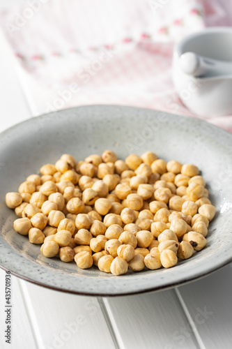 Peeled roasted hazelnut kernels.