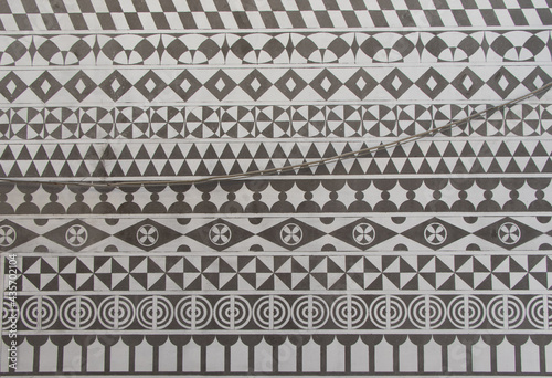 Fototapeta Naklejka Na Ścianę i Meble -  Carved geometric shapes on a wall in the Pyrgi village at South Chios Island