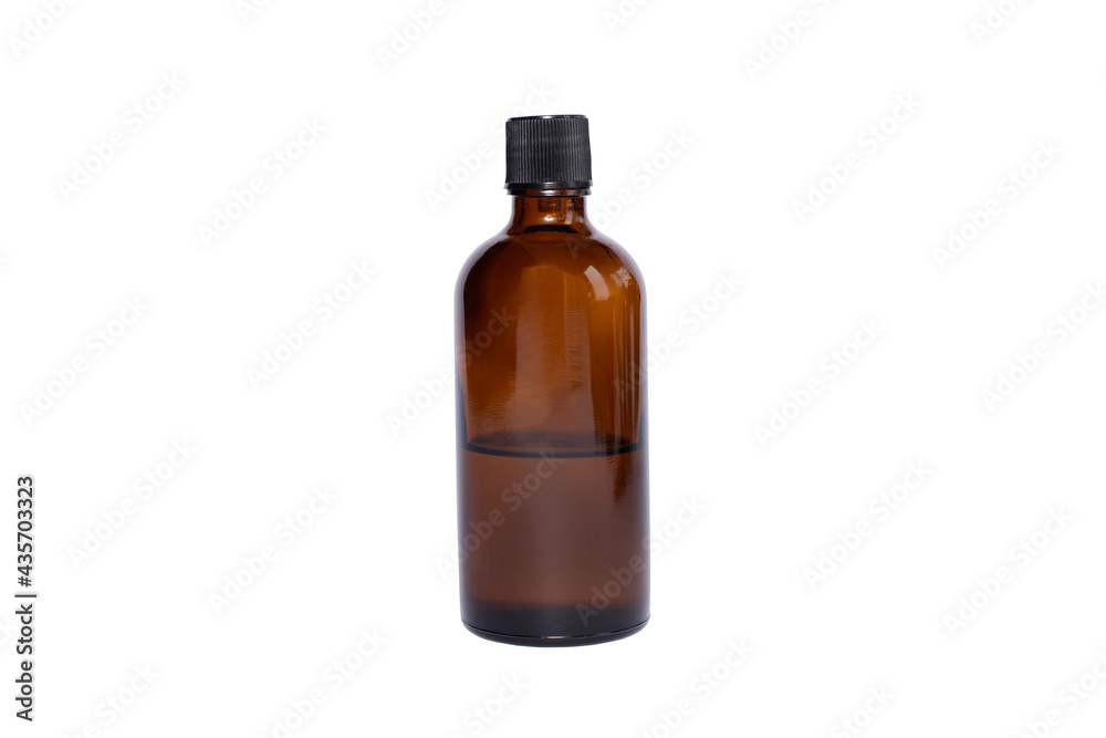 medical brown glass oil jar with black lid on white isolated background