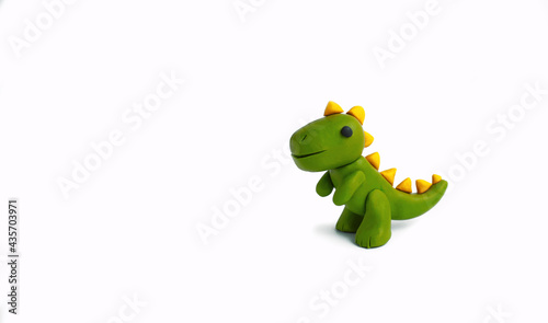 Fototapeta Naklejka Na Ścianę i Meble -  plasticine dinosaur on a white background
