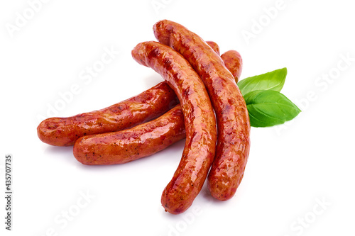 Roasted breakfast sausages, isolated on white background. High resolution image.