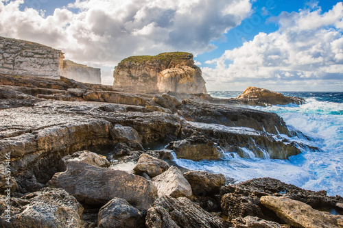 Waves crashing over the rocky shore