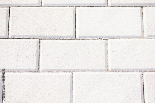 White wall bricks with geometric shapes