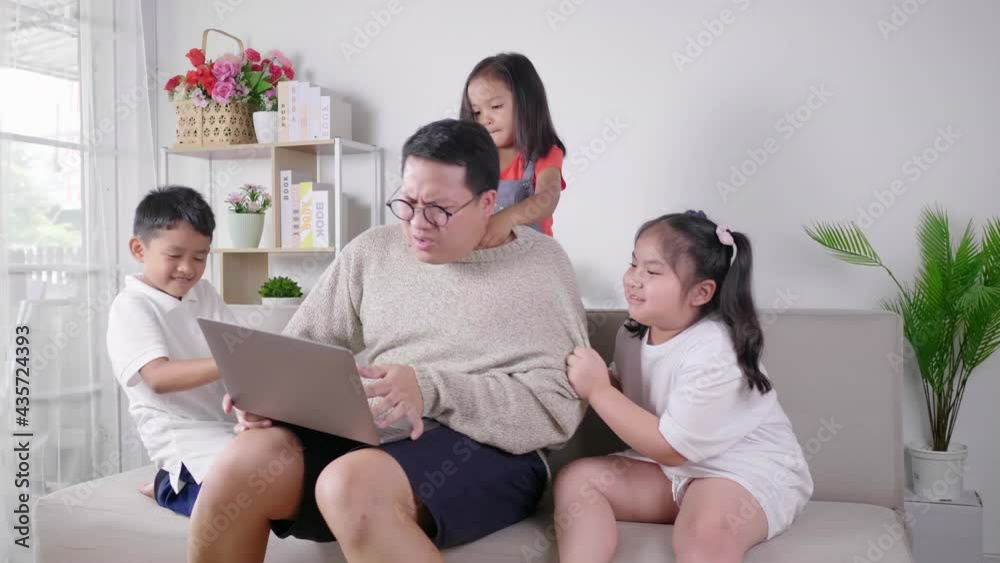 Tired Dad with two girls and a boy trying to bother their father laptop during quarantine. Stay at home concept. Online working and looking after the kids at the same time while working from home Tired Dad with two girls and a boy trying to bother their father laptop during quarantine. Stay at home concept. Online working and looking after the kids at the same time while working from home