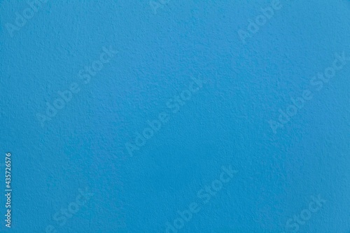 Cement wall painted blue texture and background seamless