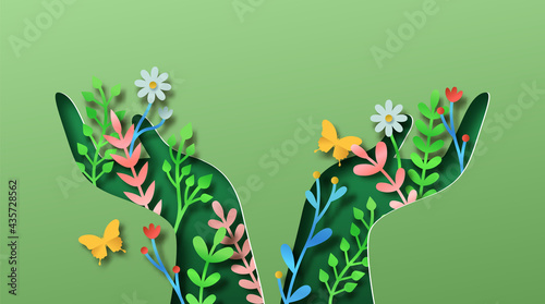 Green hand nature plant leaf papercut concept #435728562