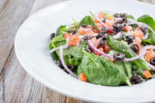 A view of a spinach garden salad.