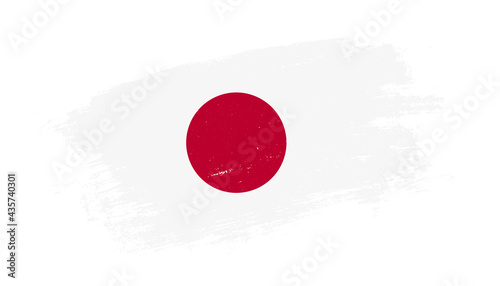 Flag of Japan country on brush paint stroke trail view. Elegant texture of national country flag