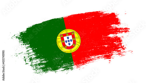 Flag of Portugal country on brush paint stroke trail view. Elegant texture of national country flag