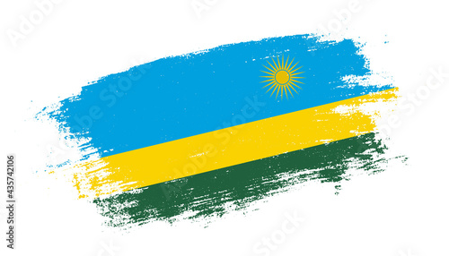 Flag of Rwanda country on brush paint stroke trail view. Elegant texture of national country flag