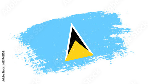 Flag of Saint Lucia country on brush paint stroke trail view. Elegant texture of national country flag