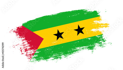 Flag of Sao Tome and Principe country on brush paint stroke trail view. Elegant texture of national country flag