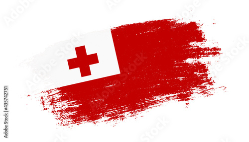 Flag of Tonga country on brush paint stroke trail view. Elegant texture of national country flag