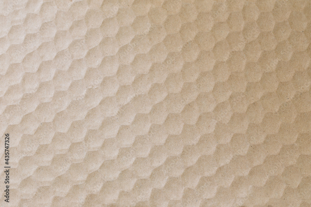 Fototapeta premium recycled packaging cardboard texture with honeycomb