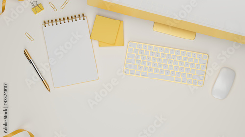 Yellow pastel computer device with accessories and stationery on white table, 3D rendering