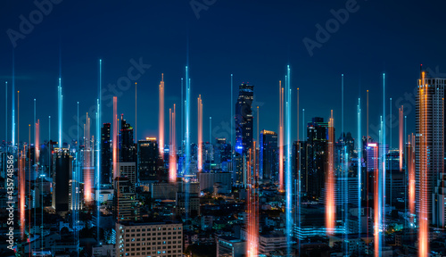 Smart city with wireless network connection and cityscape.big data connection technology concept.Wireless network and Connection technology concept with city background at night.