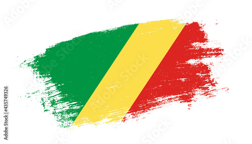 Flag of Republic of the Congo country on brush paint stroke trail view. Elegant texture of national country flag