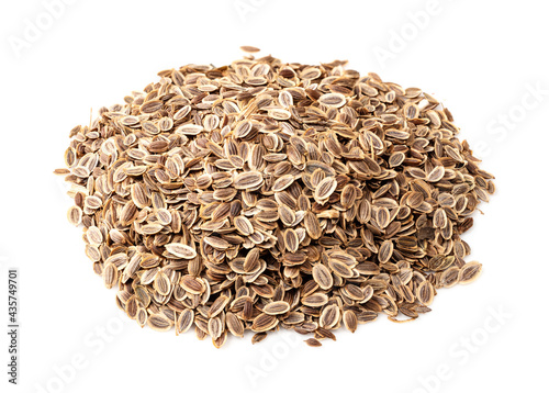 Fotografija pile of dill seeds closeup on white