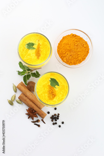 Golden milk with milk, turmeric, cinnamon, ginger ,black pepper, honey for healthy drink