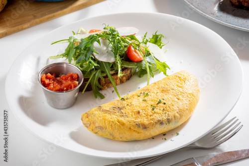 Avocado Tartin and mushroom omelette