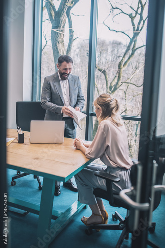 Wallpaper Mural Displeased chief with document and female assistant Torontodigital.ca