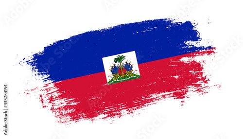 Flag of Haiti country on brush paint stroke trail view. Elegant texture of national country flag