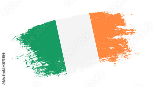 Flag of Ireland country on brush paint stroke trail view. Elegant texture of national country flag photo