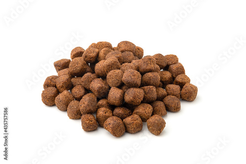Heap of Floating Pellet fish feed on white background.close up macro