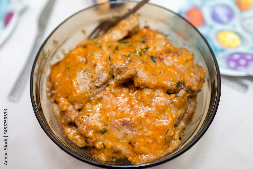 grilled steaks with sauce in bowl on the table. Delicious dinner idea, unhealthy food. grilled steaks with sauce in bowl on the table. Delicious dinner idea, unhealthy food.